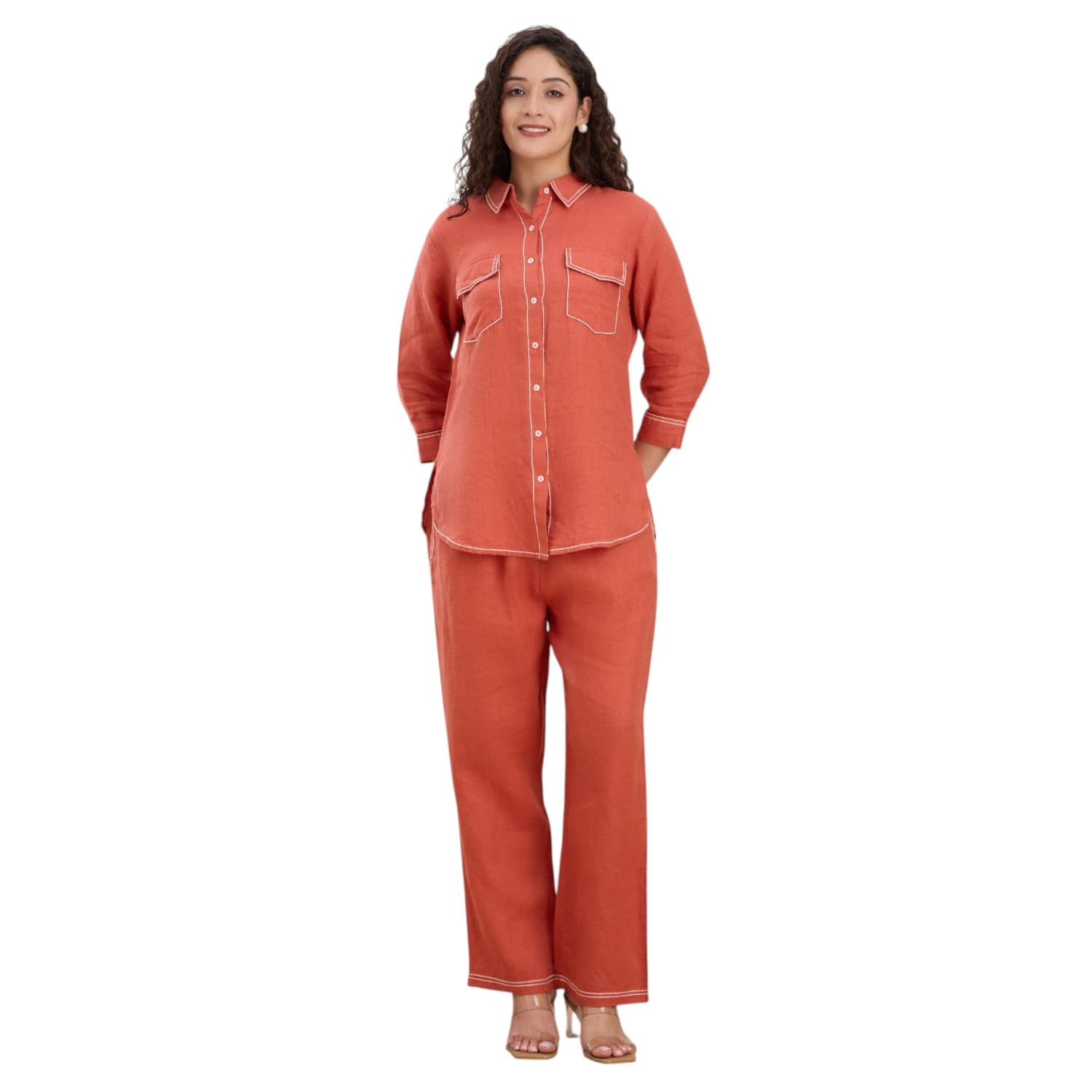 Terracotta linen co-ord set with white saddle stitch.